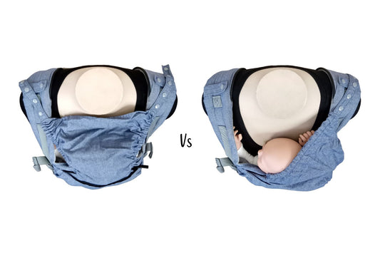 two mannequins wearing baby dolls in a boba x baby carrier. the first has the hood up fully obscuring the view of the baby, the second has the hood attached on the diagonal, and the baby's face is easily visable