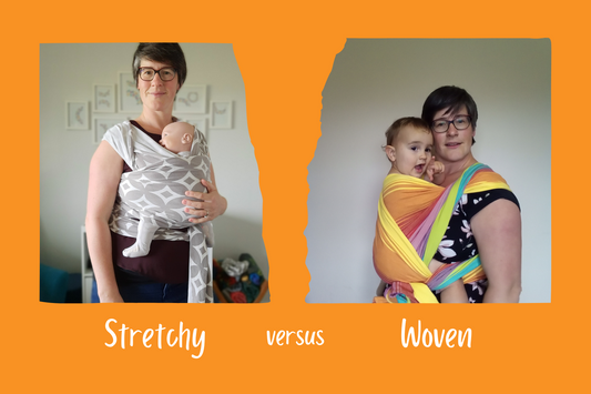 Joy riders babywearing consultant wearing a demo doll in a stretchy wrap and a toddler in a rainbow woven wrap on an orange background