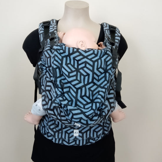 Blue and black geometric pattern lenny lamb lenny up being worn by a mannequin